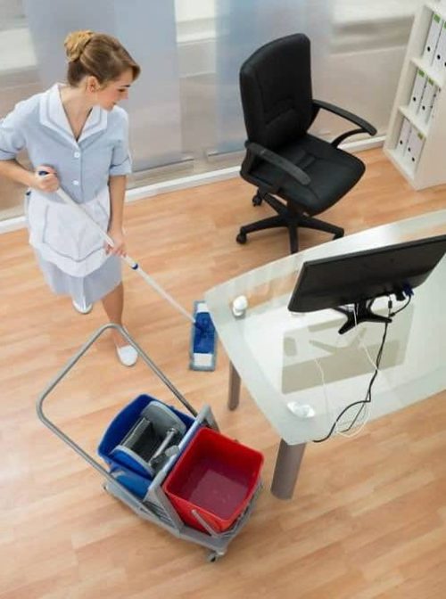 janitor-cleaning-hardwood-floor-to-prevent-office-chair-scratching-it